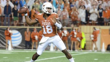 Nov 26, 2015; Austin, TX, USA; Texas Longhorns quarterback Tyrone Swoopes (18) passes the ball against the Texas Tech Red Raiders during the third quarter at Darrell K Royal-Texas Memorial Stadium. Texas Tech beat Texas 48-45. Mandatory Credit: Brendan Maloney-USA TODAY Sports
