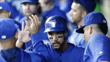 Aug 4, 2016; Houston, TX, USA; Toronto Blue Jays second baseman Devon Travis (29) celebrates his run against the Houston Astros in the first inning at Minute Maid Park. Mandatory Credit: Thomas B. Shea-USA TODAY Sports