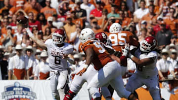 Oct 10, 2015; Dallas, TX, USA; Oklahoma Sooners quarterback Baker Mayfield (6) throws in the pocket against the Texas Longhorns during Red River rivalry at Cotton Bowl Stadium. Mandatory Credit: Matthew Emmons-USA TODAY Sports