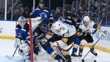 ST. LOUIS, MO - DECEMBER 12: Jordan Binnington #50 Alex Pietrangelo #27 and Ryan O'Reilly #90 of the St. Louis Blues defend the net against Paul Stastny #26 and Valentin Zykov of the Vegas Golden Knights at Enterprise Center on December 12, 2019 in St. Louis, Missouri. (Photo by Scott Rovak/NHLI via Getty Images)
