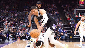 Kings guard Tyrese Haliburton (0) controls a loose ball: Kelley L Cox-USA TODAY Sports