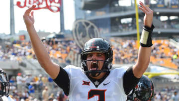 PITTSBURGH, PA - SEPTEMBER 16: Mason Rudolph #2 of the Oklahoma State Cowboys celebrates after a touchdown by Dillon Stoner #17 (not pictured) during the first quarter against the Pittsburgh Panthers at Heinz Field on September 16, 2017 in Pittsburgh, Pennsylvania. (Photo by Joe Sargent/Getty Images)