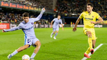 Alfonso Pedraza of Villarreal CF and Abdessamad Ezzalzouli of Barcelona FC. (Photo by Xisco Navarro Pardo/SOPA Images/LightRocket via Getty Images)