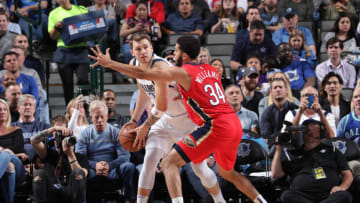 DALLAS, TX - MARCH 18: Luka Doncic #77 of the Dallas Mavericks posts up on Kenrich Williams #34 of the New Orleans Pelicans on March 18, 2019 at the American Airlines Center in Dallas, Texas. NOTE TO USER: User expressly acknowledges and agrees that, by downloading and or using this photograph, User is consenting to the terms and conditions of the Getty Images License Agreement. Mandatory Copyright Notice: Copyright 2019 NBAE (Photo by Glenn James/NBAE via Getty Images)