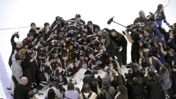 Apr 12, 2014; Philadelphia, PA, USA; Union Dutchmen pose for a picture after defeating the Minnesota Gophers in the championship game of the Frozen Four college ice hockey tournament at Wells Fargo Center. Union defeated Minnesota, 7-4 to win the NCAA Championship. Mandatory Credit: Eric Hartline-USA TODAY Sports