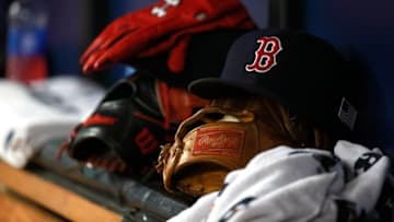 Sep 11, 2015; St. Petersburg, FL, USA; Boston Red Sox hat and gloves lay in the dugout at Tropicana Field. Mandatory Credit: Kim Klement-USA TODAY Sports