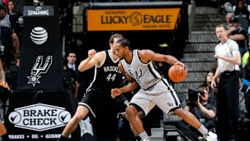 SAN ANTONIO, TX - DECEMBER 10: Kawhi Leonard #2 of the San Antonio Spurs handles the ball during the game against the Brooklyn Nets on December 10, 2016 at the AT&T Center in San Antonio, Texas. NOTE TO USER: User expressly acknowledges and agrees that, by downloading and or using this photograph, user is consenting to the terms and conditions of the Getty Images License Agreement. Mandatory Copyright Notice: Copyright 2016 NBAE (Photos by Chris Covatta/NBAE via Getty Images)