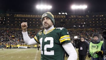 Jan 8, 2017; Green Bay, WI, USA; Green Bay Packers quarterback Aaron Rodgers (12) celebrates as he leaves the field after defeating the New York Giants in the NFC Wild Card playoff football game at Lambeau Field. Mandatory Credit: Jeff Hanisch-USA TODAY Sports