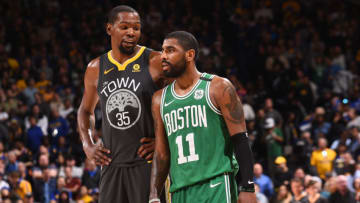 OAKLAND, CA - JANUARY 27: Kevin Durant #35 of the Golden State Warriors and Kyrie Irving #11 of the Boston Celtics during the game on January 27, 2018 at ORACLE Arena in Oakland, California. NOTE TO USER: User expressly acknowledges and agrees that, by downloading and/or using this photograph, user is consenting to the terms and conditions of Getty Images License Agreement. Mandatory Copyright Notice: Copyright 2018 NBAE (Photo by Noah Graham/NBAE via Getty Images)