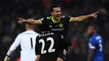 LEICESTER, ENGLAND - JANUARY 14: Pedro of Chelsea celebrate scoring with Willian during the Premier League match between Leicester City and Chelsea at The King Power Stadium on January 14, 2017 in Leicester, England. (Photo by Laurence Griffiths/Getty Images)