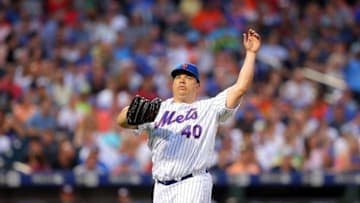 Jul 7, 2016; New York City, NY, USA; New York Mets starting pitcher Bartolo Colon (40) reacts after allowing three solo home runs to the Washington Nationals during the fourth inning at Citi Field. Mandatory Credit: Brad Penner-USA TODAY Sports