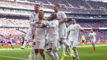 MADRID, SPAIN - FEBRUARY 09: Casemiro of Real Madrid celebrates scoring his team's opening goal with team mates during the La Liga match between Club Atletico de Madrid and Real Madrid CF at Wanda Metropolitano on February 09, 2019 in Madrid, Spain. (Photo by Quality Sport Images/Getty Images)