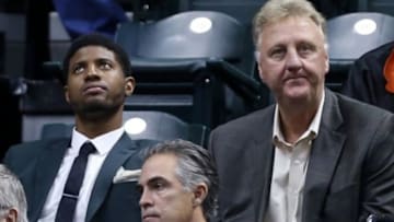 Oct 7, 2014; Indianapolis, IN, USA; Indiana Pacers forward Paul George sits next to Indiana president Larry Bird during the game against the Minnesota Timberwolves at Bankers Life Fieldhouse. Mandatory Credit: Brian Spurlock-USA TODAY Sports