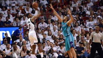 Apr 17, 2016; Miami, FL, USA; Miami Heat forward Joe Johnson (2) shoots over Charlotte Hornets guard Nicolas Batum (5) during the first half in game one of the first round of the NBA Playoffs at American Airlines Arena. Mandatory Credit: Steve Mitchell-USA TODAY Sports