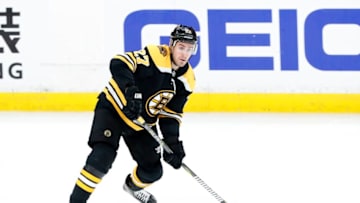 BOSTON, MA - APRIL 19: Boston Bruins defenseman John Moore (27) looks to pass during Game 5 of the First Round Stanley Cup Playoffs between the Boston Bruins and the Toronto Maple Leafs on April 19, 2019, at TD garden in Boston, Massachusetts. (Photo by Fred Kfoury III/Icon Sportswire via Getty Images)