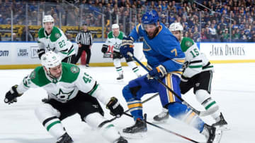 ST. LOUIS, MO - MARCH 2: Roman Polak #45 of the Dallas Stars defends against Pat Maroon #7 of the St. Louis Blues at Enterprise Center on March 2, 2019 in St. Louis, Missouri. (Photo by Joe Puetz/NHLI via Getty Images)