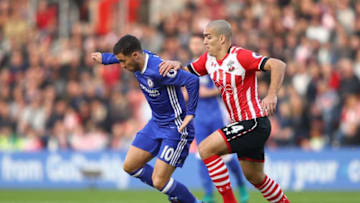 SOUTHAMPTON, ENGLAND - OCTOBER 30: Eden Hazard of Chelsea (L) is pulled by Oriol Romeu of Southampton (R) during the Premier League match between Southampton and Chelsea at St Mary's Stadium on October 30, 2016 in Southampton, England. (Photo by Ian Walton/Getty Images)