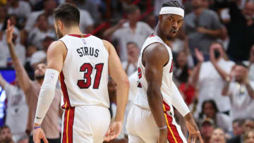 Jimmy Butler #22 of the Miami Heat celebrates a three pointer with Max Strus #31 against the Philadelphia 76ers(Photo by Michael Reaves/Getty Images)