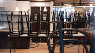 NEW YORK, NY, - APRIL 18: Chairs on tables in a restaurant are seen as U.S. cities continue to shelter-in-place during the coronavirus pandemic on April 18, 2020 in New York City. COVID-19 has spread to most countries around the world, claiming almost 160,000 lives and infecting over 2.3 million people. (Photo by John Lamparski/Getty Images)