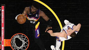 Deandre Ayton #22 of the Phoenix Suns lays up a shot past Nikola Jokic #15 of the Denver Nuggets during the first half in Game Two of the Western Conference second-round playoff series at Phoenix Suns Arena on 9 Jun. 2021 in Phoenix, Arizona. The Suns defeated the Nuggets 123-98. (Photo by Christian Petersen/Getty Images)