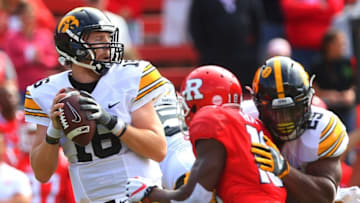 Sep 24, 2016; Piscataway, NJ, USA; Iowa Hawkeyes quarterback C.J. Beathard (16) drops back to pass during the first half of their game against the Rutgers Scarlet Knights at High Points Solutions Stadium. Mandatory Credit: Ed Mulholland-USA TODAY Sports