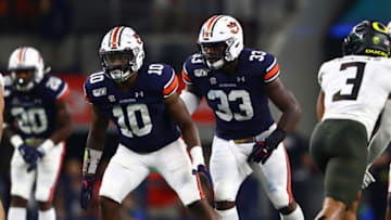 Auburn footballAug 31, 2019; Arlington, TX, USA; Auburn Tigers linebacker K.J. Britt (33) and Owen Pappoe (10) in action against the Oregon Ducks at AT&T Stadium. Mandatory Credit: Matthew Emmons-USA TODAY Sports