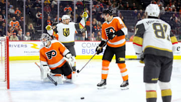 PHILADELPHIA, PENNSYLVANIA - MARCH 14: Felix Sandstrom #32 of the Philadelphia Flyers and Ivan Barbashev #49 of the Vegas Golden Knights react following a goal by Jonathan Marchessault #81 of the Vegas Golden Knights during the third periodat Wells Fargo Center on March 14, 2023 in Philadelphia, Pennsylvania. (Photo by Tim Nwachukwu/Getty Images)