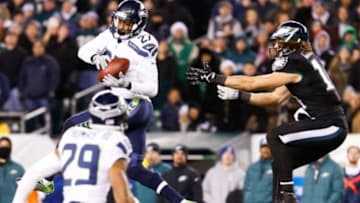 Dec 7, 2014; Philadelphia, PA, USA; Seattle Seahawks cornerback Tharold Simon (27) intercepts a ball intended for Philadelphia Eagles wide receiver Riley Cooper (14) during the second half at Lincoln Financial Field. The Seahawks defeated the Eagles 24-14. Mandatory Credit: Bill Streicher-USA TODAY Sports
