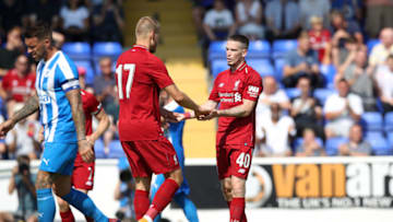 CHESTER, ENGLAND - JULY 07: Ryan Kent of Liverpool celebrates scoring with Ragnar Klavan of Liverpool during the Pre-season friendly between Chester FC and Liverpool on July 7, 2018 in Chester, United Kingdom. (Photo by Lynne Cameron/Getty Images)