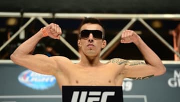 Jul 10, 2015; Las Vegas, NV, USA; Thomas Almeida weighs in for his bout against Brad Pickett (not pictured) during weigh-ins for UFC 189 at MGM Grand Garden Arena. Mandatory Credit: Joe Camporeale-USA TODAY Sports