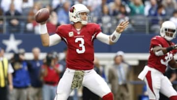 Nov 2, 2014; Arlington, TX, USA; Arizona Cardinals quarterback Carson Palmer (3) throws in the pocket against the Dallas Cowboys at AT&T Stadium. Mandatory Credit: Matthew Emmons-USA TODAY Sports