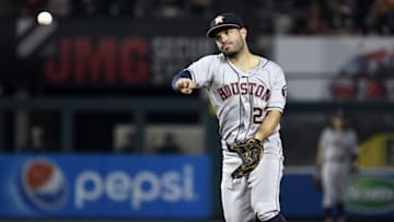 Jun 27, 2016; Anaheim, CA, USA; Houston Astros second baseman Jose Altuve (27) throws to first during the fourth inning against the Los Angeles Angels at Angel Stadium of Anaheim. Mandatory Credit: Richard Mackson-USA TODAY Sports