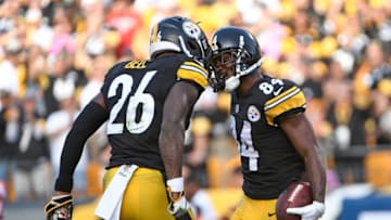 PITTSBURGH, PA - OCTOBER 22: Antonio Brown #84 of the Pittsburgh Steelers celebrates seven-yard touchdown reception with Le'Veon Bell #26 in the first quarter against the Cincinnati Bengals at Heinz Field on October 22, 2017 in Pittsburgh, Pennsylvania. (Photo by Justin Berl/Getty Images)