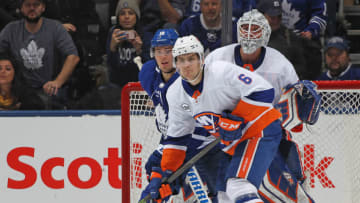TORONTO, ON - DECEMBER 29: Ryan Pulock #6 of the New York Islanders defends against Andreas Johnsson #18 of the Toronto Maple Leafs during an NHL game at Scotiabank Arena on December 29, 2018 in Toronto, Ontario, Canada. The Islanders defeated the Maple Leafs 4-0.(Photo by Claus Andersen/Getty Images)