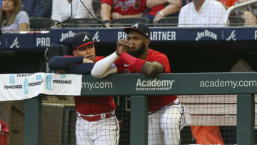 Aug 19, 2022; Atlanta, Georgia, USA; Atlanta Braves catcher William Contreras (24) talks to designated hitter Marcell Ozuna (20) in the dugout against the Houston Astros in the first inning at Truist Park. Mandatory Credit: Brett Davis-USA TODAY Sports
