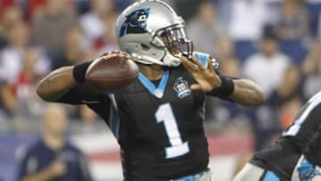Aug 22, 2014; Foxborough, MA, USA; Carolina Panthers quarterback Cam Newton (1) passes against the New England Patriots during the first quarter at Gillette Stadium. Mandatory Credit: Stew Milne-USA TODAY Sports