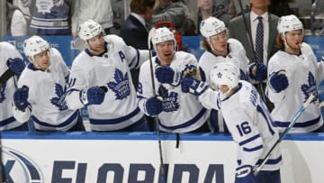 SUNRISE, FL - DECEMBER 15: Teammates congratulate Mitch Marner #16 of the Toronto Maple Leafs after he scored his second goal of the third period against the Florida Panthers at the BB&T Center on December 15, 2018 in Sunrise, Florida. the Panthers defeated the Maple Leafs 4-3 in overtime. (Photo by Joel Auerbach/Getty Images)