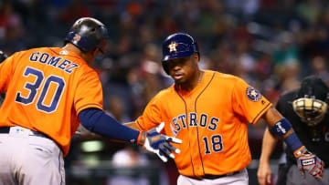 May 31, 2016; Phoenix, AZ, USA; Houston Astros third baseman Luis Valbuena (right) celebrates with teammate Carlos Gomez after hitting a home run in the fifth inning against the Arizona Diamondbacks at Chase Field. Mandatory Credit: Mark J. Rebilas-USA TODAY Sports