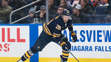 Jan 2, 2020; Buffalo, New York, USA; Buffalo Sabres center Zemgus Girgensons (28) chases the puck in the second period against the Edmonton Oilers at KeyBank Center. Mandatory Credit: Mark Konezny-USA TODAY Sports