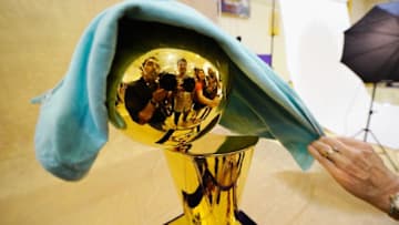 EL SEGUNDO, CA - SEPTEMBER 25: NBA Finals Larry O'Brien Championship Trophy is covered with a protective cloth as it rest on a stand during Los Angeles Lakers Media Day at the Toyota Center on September 25, 2010 in El Segundo, California. NOTE TO USER: User expressly acknowledges and agrees that, by downloading and/or using this Photograph, user is consenting to the terms and conditions of the Getty Images License Agreement. (Photo by Kevork Djansezian/Getty Images)