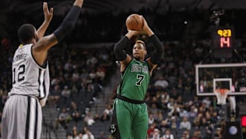 Dec 5, 2015; San Antonio, TX, USA; Boston Celtics center Jared Sullinger (7) shoots the ball over San Antonio Spurs power forward LaMarcus Aldridge (12) during the first half at AT&T Center. Mandatory Credit: Soobum Im-USA TODAY Sports