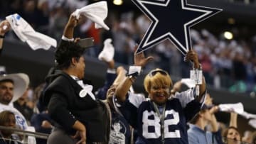 Jan 4, 2015; Arlington, TX, USA; Dallas Cowboys fans cheer during the fourth quarter against the Detroit Lions in the NFC Wild Card Playoff Game at AT&T Stadium. Mandatory Credit: Matthew Emmons-USA TODAY Sports