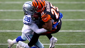 Dallas Cowboys cornerback Rashard Robinson (28) tackled Cincinnati Bengals running back Giovani Bernard (25) for a loss in the third quarter of a Week 14 NFL football game, Sunday, Dec. 13, 2020, at Paul Brown Stadium in Cincinnati. The Dallas Cowboys won, 30-7.Dallas Cowboys At Cincinnati Bengals Dec 13