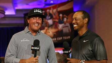 WEST CONSHOHOCKEN, PA - SEPTEMBER 04: Phil Mickelson and Tiger Woods are interviewed by the Golf Channel after being named as Captain's Picks along with Bryson DeChambeau by U.S. Ryder Cup Captain for the 2018 U.S. team during a press conference at the Philadelphia Marriott West on September 4, 2018 in West Conshohocken, Pennsylvania. (Photo by Rich Schultz/Getty Images)