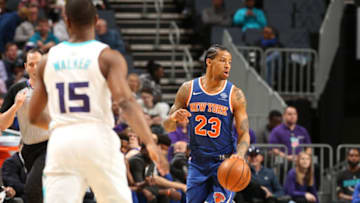 CHARLOTTE, NC - MARCH 26: Trey Burke #23 of the New York Knicks handles the ball against the Charlotte Hornets on March 26, 2018 at Spectrum Center in Charlotte, North Carolina. Copyright 2018 NBAE (Photo by Kent Smith/NBAE via Getty Images)