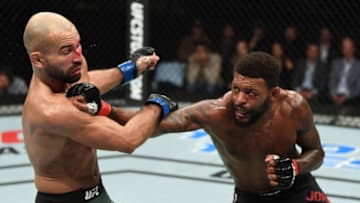 MONCTON, NB - OCTOBER 27: (R-L) Michael Johnson punches Artem Lobov of Russia in their featherweight bout during the UFC Fight Night event inside Avenir Centre on October 27, 2018 in Moncton, New Brunswick, Canada. (Photo by Jeff Bottari/Zuffa LLC/Zuffa LLC via Getty Images)