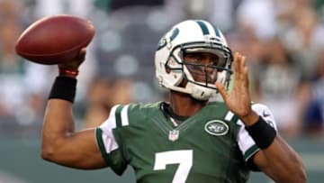 Aug 7, 2014; East Rutherford, NJ, USA; New York Jets quarterback Geno Smith (7) passes against the Indianapolis Colts during the first quarter at MetLife Stadium. Mandatory Credit: Adam Hunger-USA TODAY Sports
