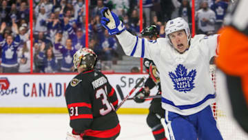 OTTAWA, ONTARIO - APRIL 16: Mitchell Marner #16 of the Toronto Maple Leafs celebrates after scoring against the Ottawa Senators in the third period at Canadian Tire Centre on April 16, 2022 in Ottawa, Ontario. (Photo by Chris Tanouye/Getty Images)