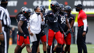CINCINNATI, OH - OCTOBER 03: Defensive coordinator Marcus Freeman of the Cincinnati Bearcats talks to his players during a game against the South Florida Bulls at Nippert Stadium on October 3, 2020 in Cincinnati, Ohio. Cincinnati won 28-7. (Photo by Joe Robbins/Getty Images)