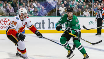 DALLAS, TX - NOVEMBER 24: Dallas Stars right wing Alexander Radulov (47) tries to pass the puck past Calgary Flames right wing Troy Brouwer (36) during the game between the Dallas Stars and the Calgary Flames on November 24, 2017 at the American Airlines Center in Dallas, Texas. Dallas beats Calgary 6-3. (Photo by Matthew Pearce/Icon Sportswire via Getty Images)